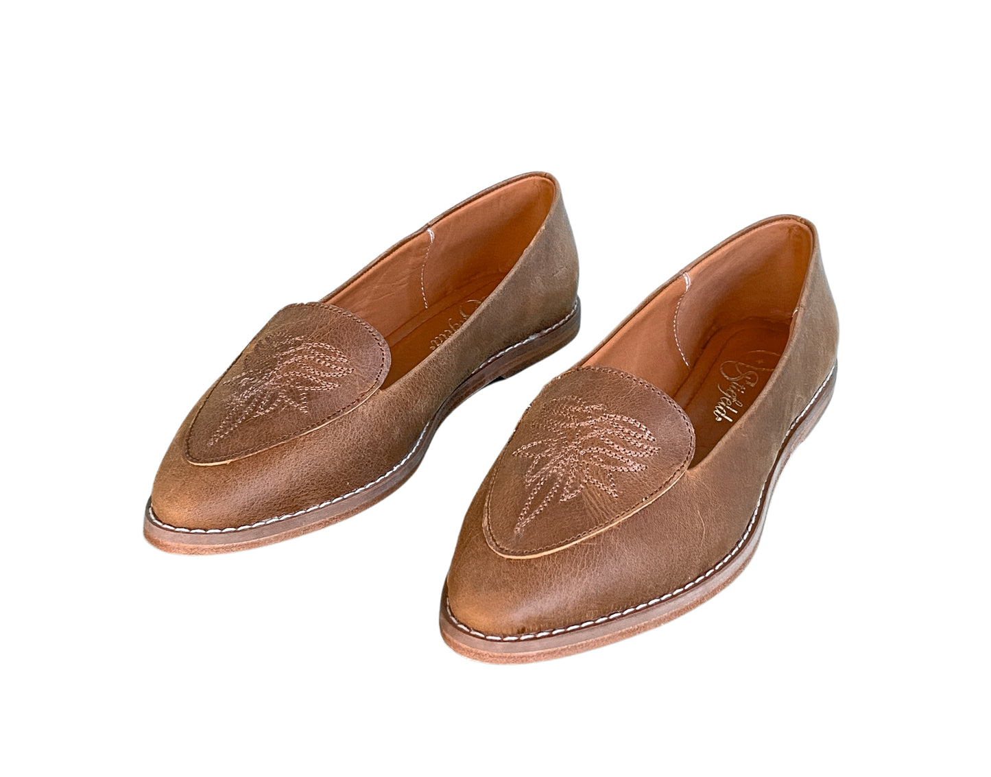 Hair-on hide and brown leather closed heel mules for women