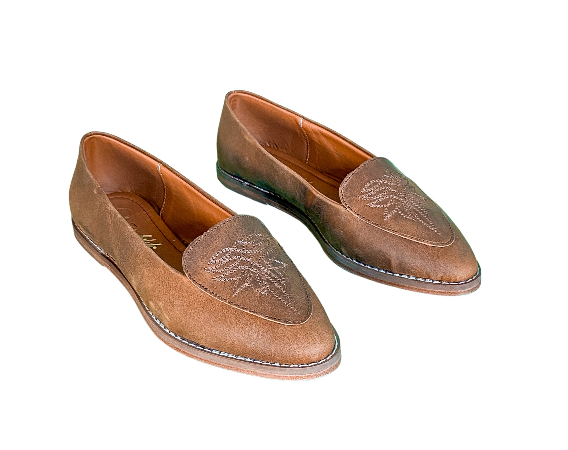 Hair-on hide and brown leather closed heel mules for women