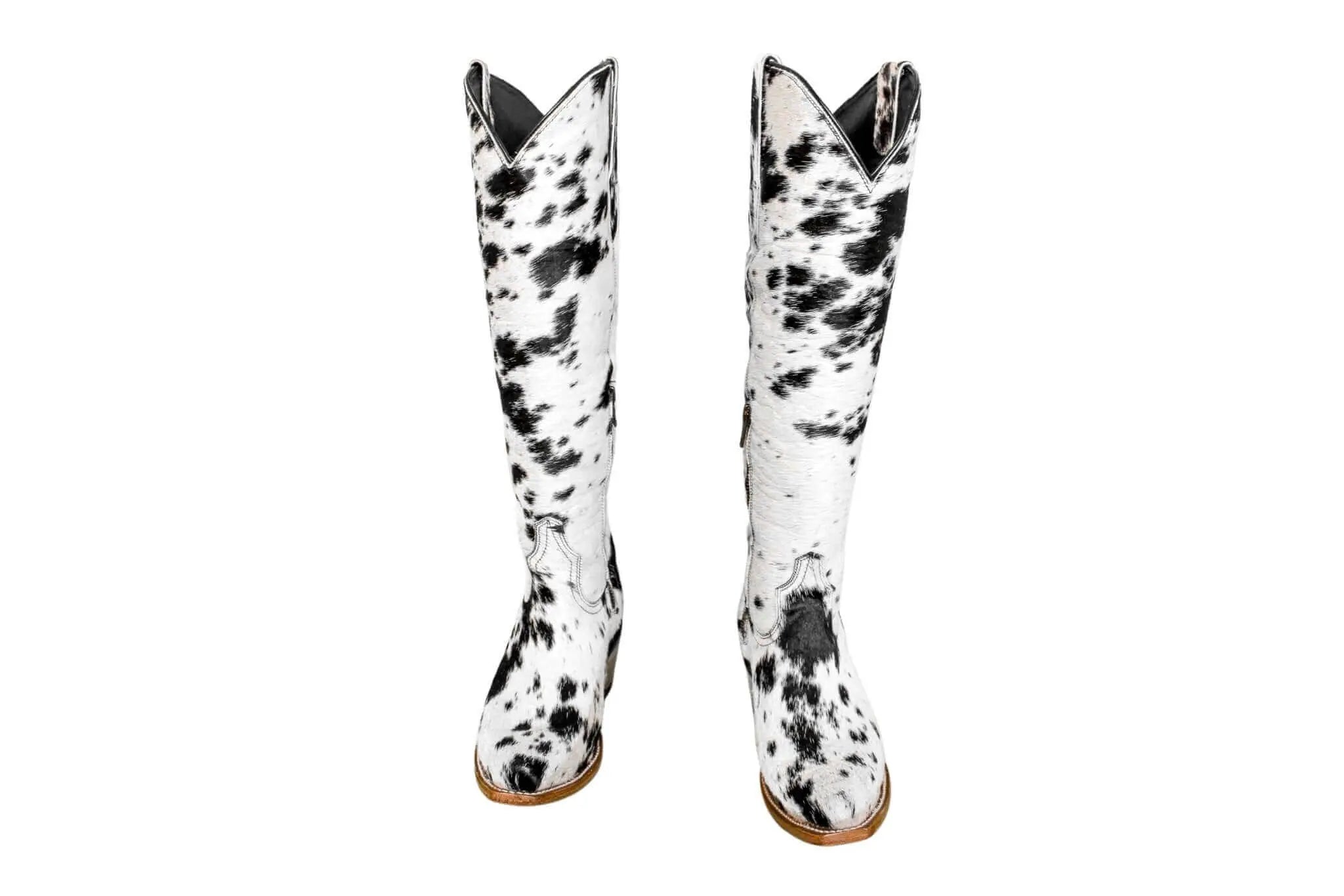front profile of Lorraine knee-high hair-on-hide boots—snip toe